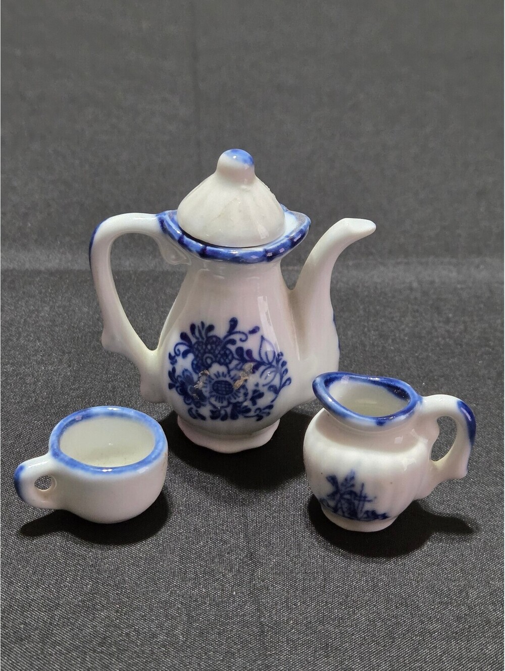 Miniature Blue and White Porcelain Tea Set with Teapot, Creamer, and Cup
